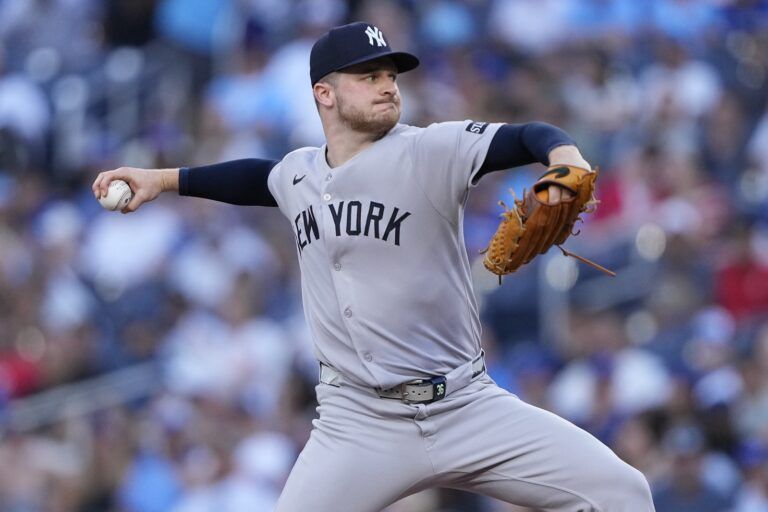 New York Yankees starting pitcher Clarke Schmidt (36) pitches to the Toronto Blue Jays during the second inning at Rogers Centre.