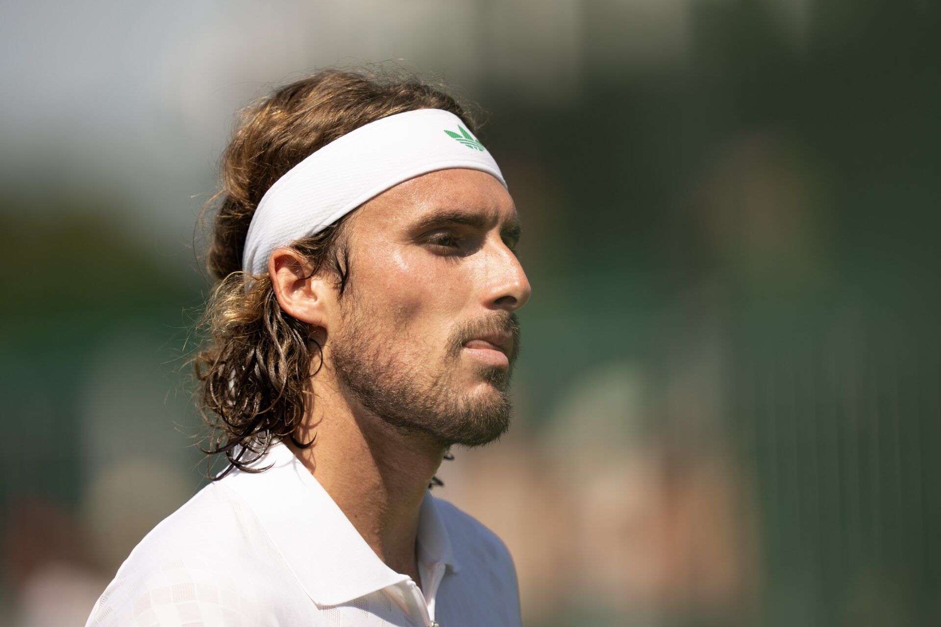 Stefanos Tsitsipas of Greece during his match against Valentin Royer of France on day one at the All England Lawn Tennis and Croquet Club.