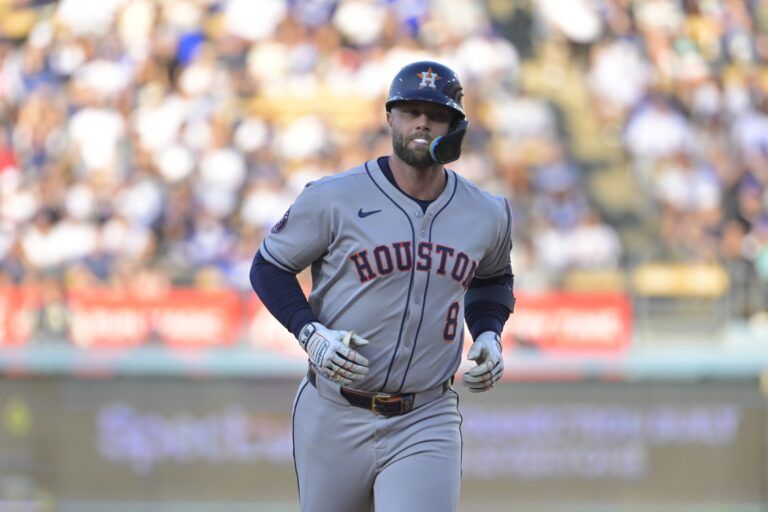 Houston Astros first base Christian Walker (8) rounds the bases on a 2 run homerun during the third inning against the Los Angeles Dodgers  at Dodger Stadium.