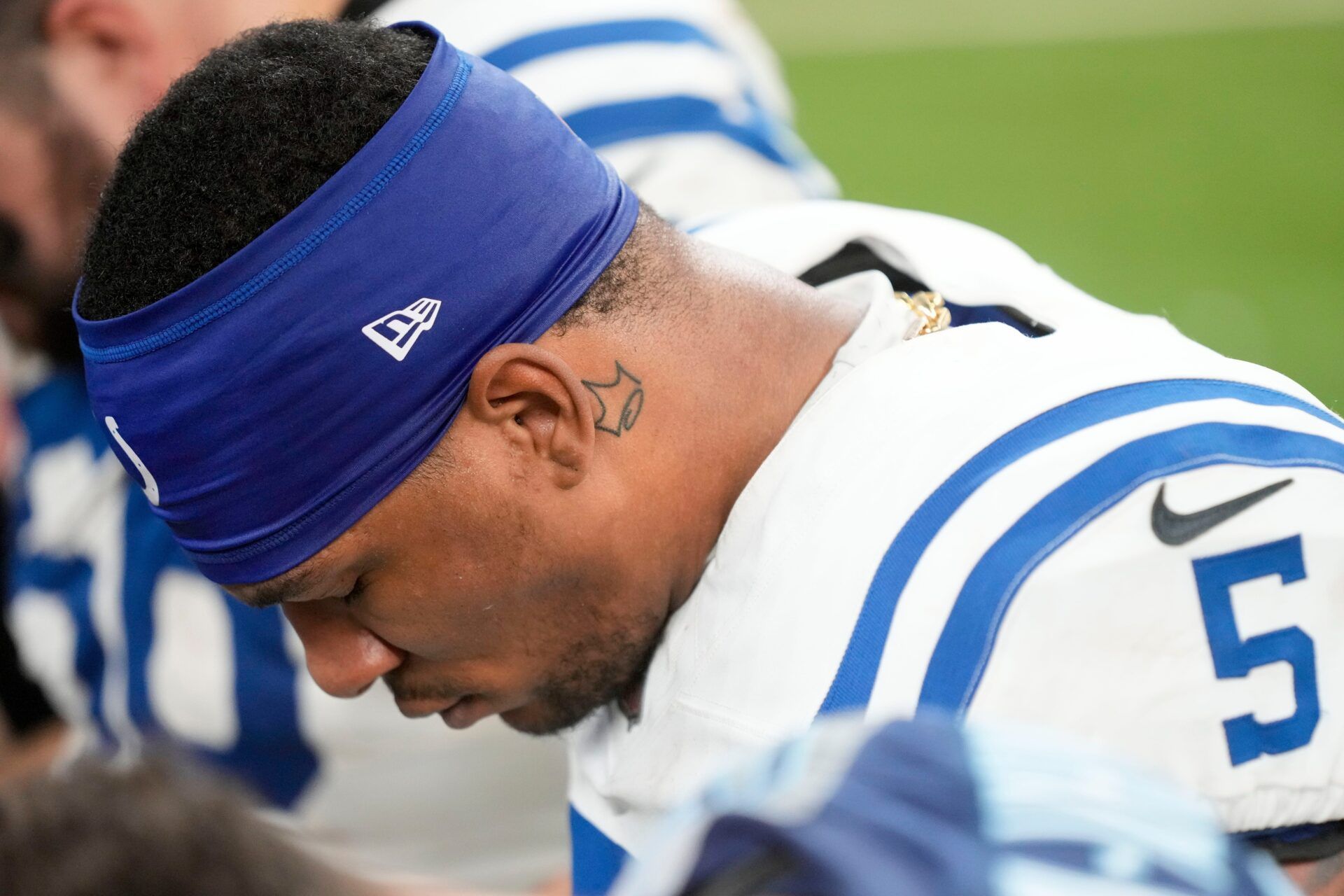 Indianapolis Colts quarterback Anthony Richardson (5) kneels in prayer Sunday, Dec. 22, 2024, after a game against the Tennessee Titans at Lucas Oil Stadium in Indianapolis.