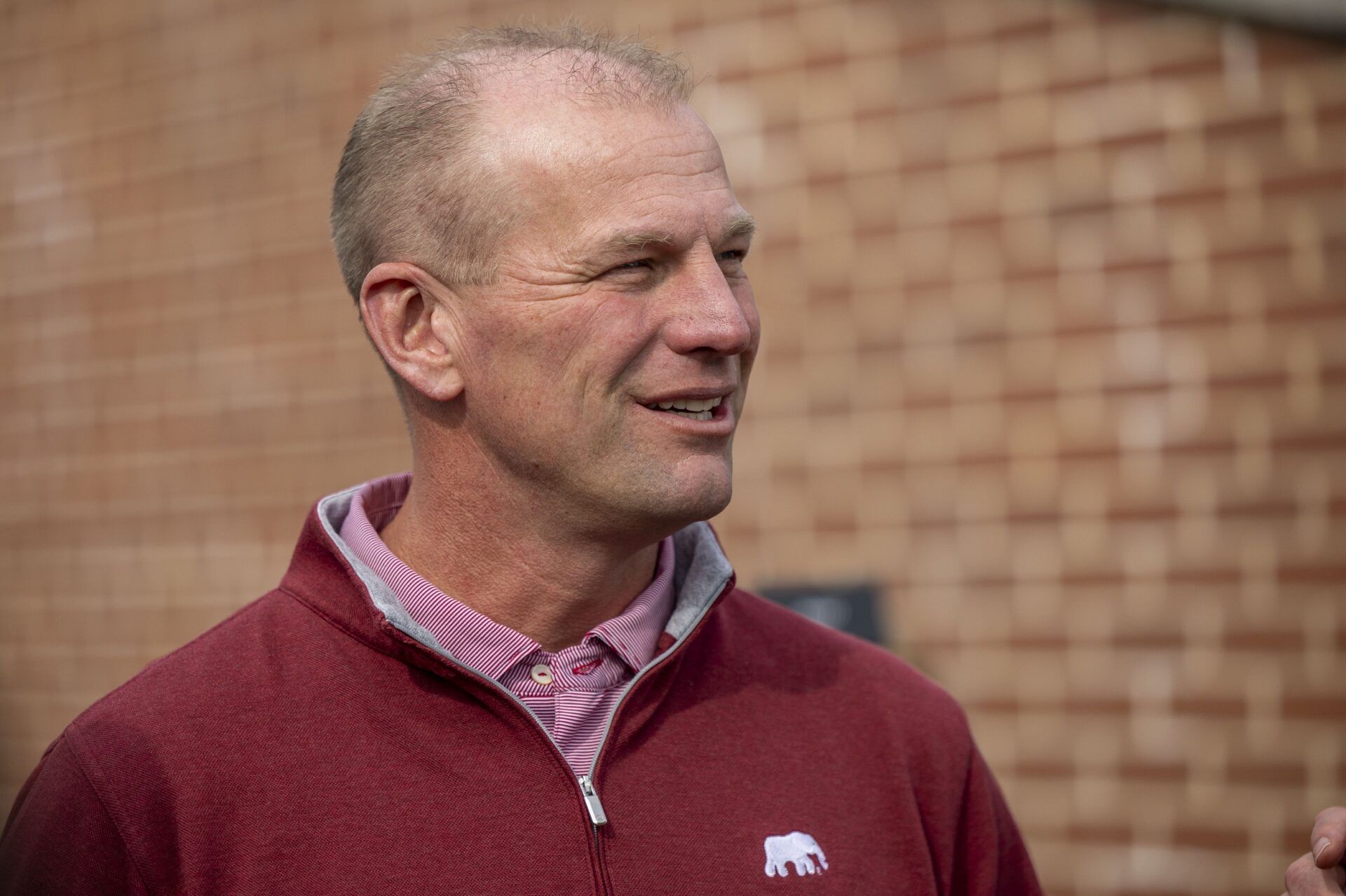 Alabama football head coach Kalen DeBoer visits the field during Senior Bowl practice for the American team at Hancock Whitney Stadium.