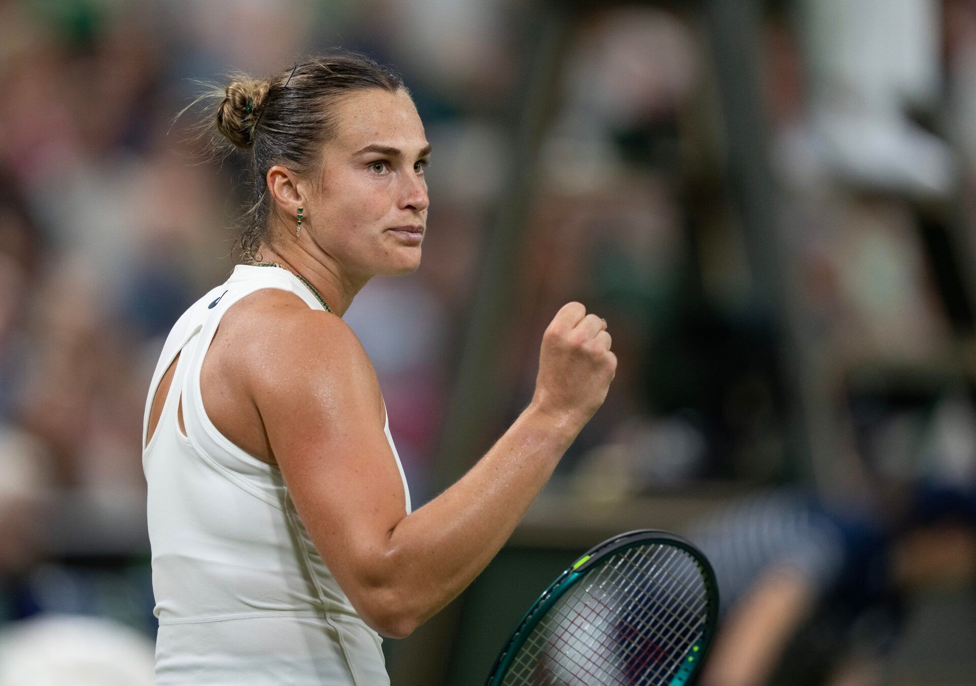 Aryna Sabalenka returns a shot during her match against Emma Raducanu of Great Britain on day five at the All England Lawn Tennis and Croquet Club.