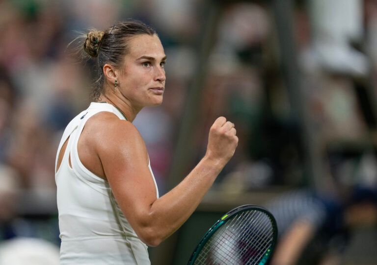Aryna Sabalenka returns a shot during her match against Emma Raducanu of Great Britain on day five at the All England Lawn Tennis and Croquet Club.