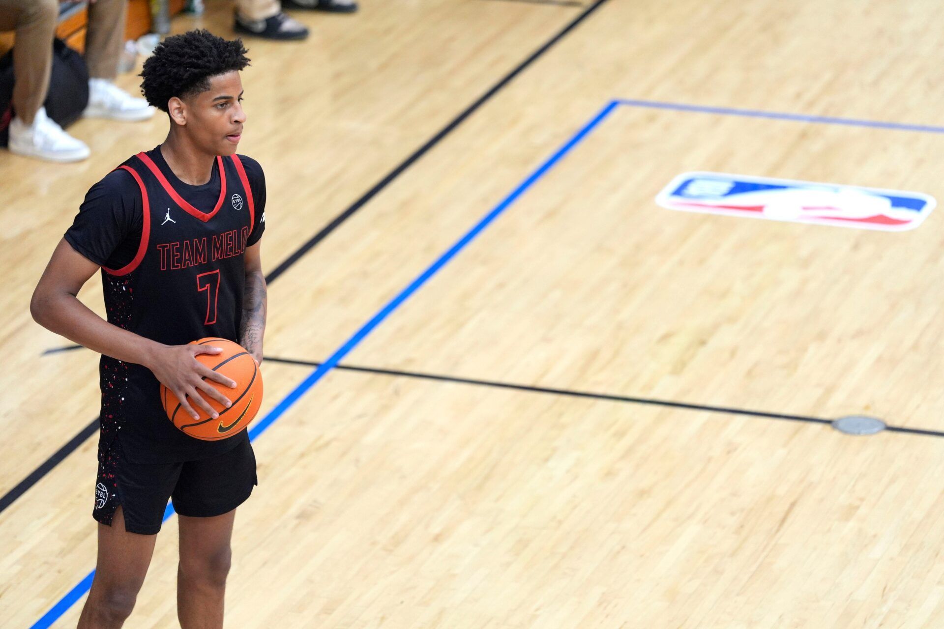 Team Melo's Kiyan Anthony (7), son of NBA star Carmelo Anthony, looks to pass during the Team Melo and Georgia Stars game at the Nike Peach Jam at Riverview Park Activities Center. The Georgia Stars won 64-63.