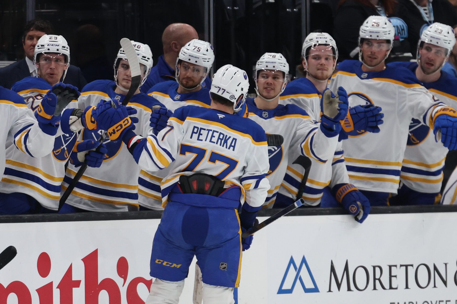 Buffalo Sabres right wing JJ Peterka (77) celebrates a power play goal against the Utah Hockey Club with the bench players during the first period at Delta Center.