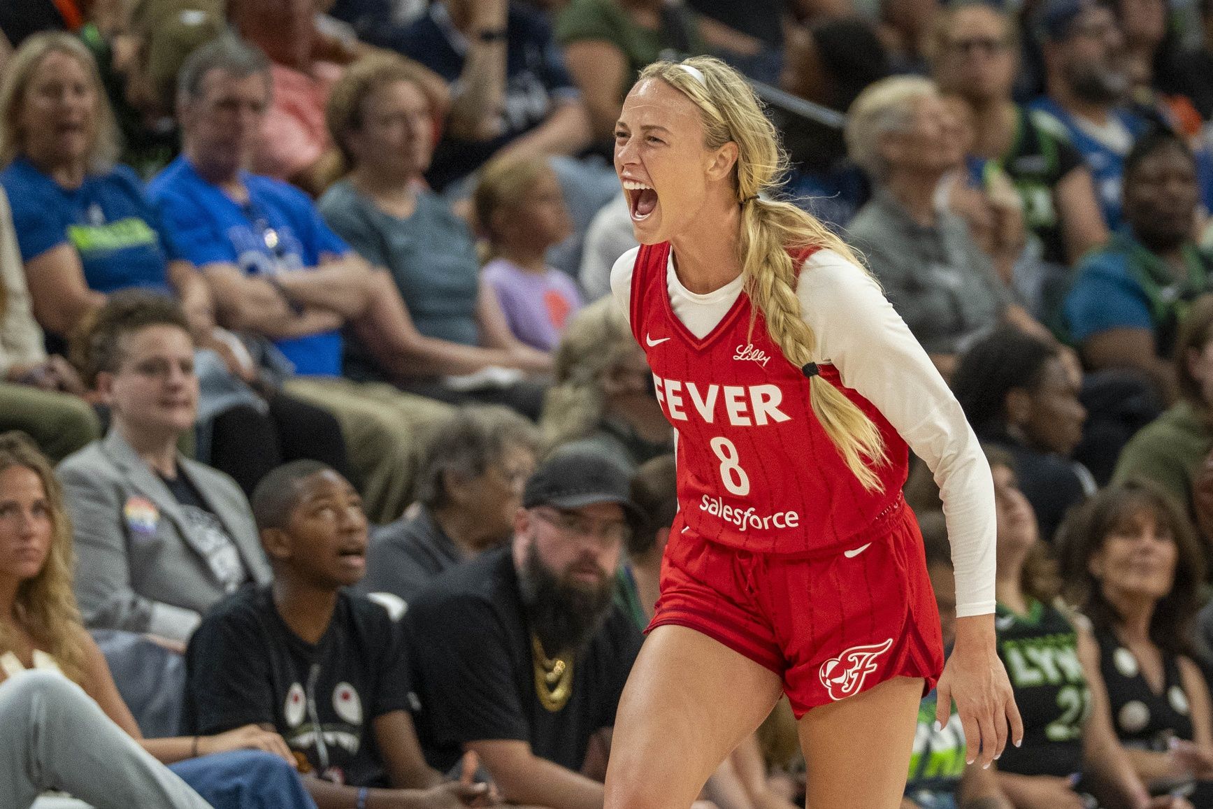 Indiana Fever guard Sophie Cunningham (8) celebrates after making a three point shot against the Minnesota Lynx in the second half during the Commissioner's Cup final at Target Center.