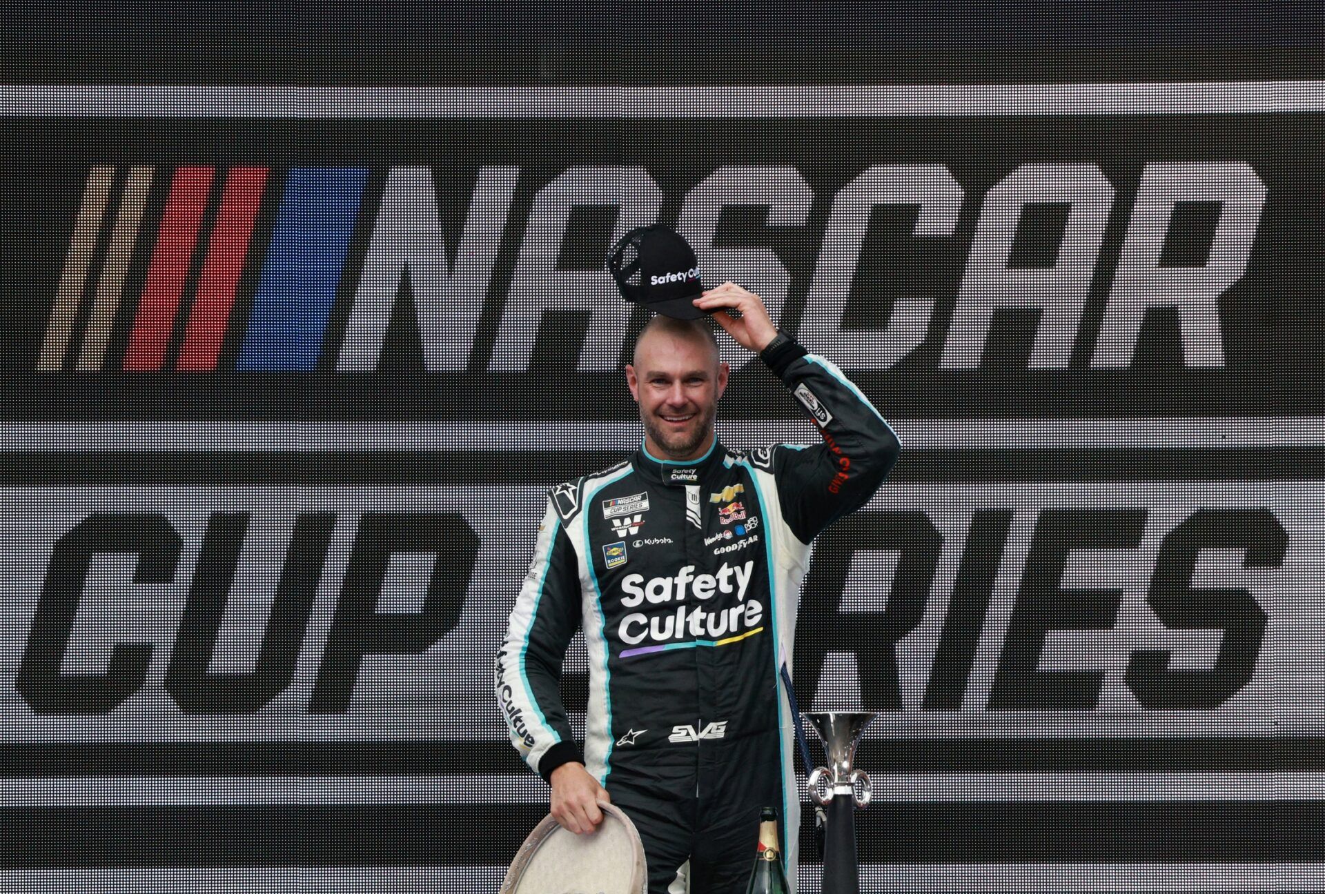 [US, Mexico & Canada customers only] June 15, 2025; Trackhouse Racing driver Shane Van Gisbergen celebrates winning on the podium after winning the NASCAR Cup Series Mexico City Race at Autodromo Hermanos Rodriguez.