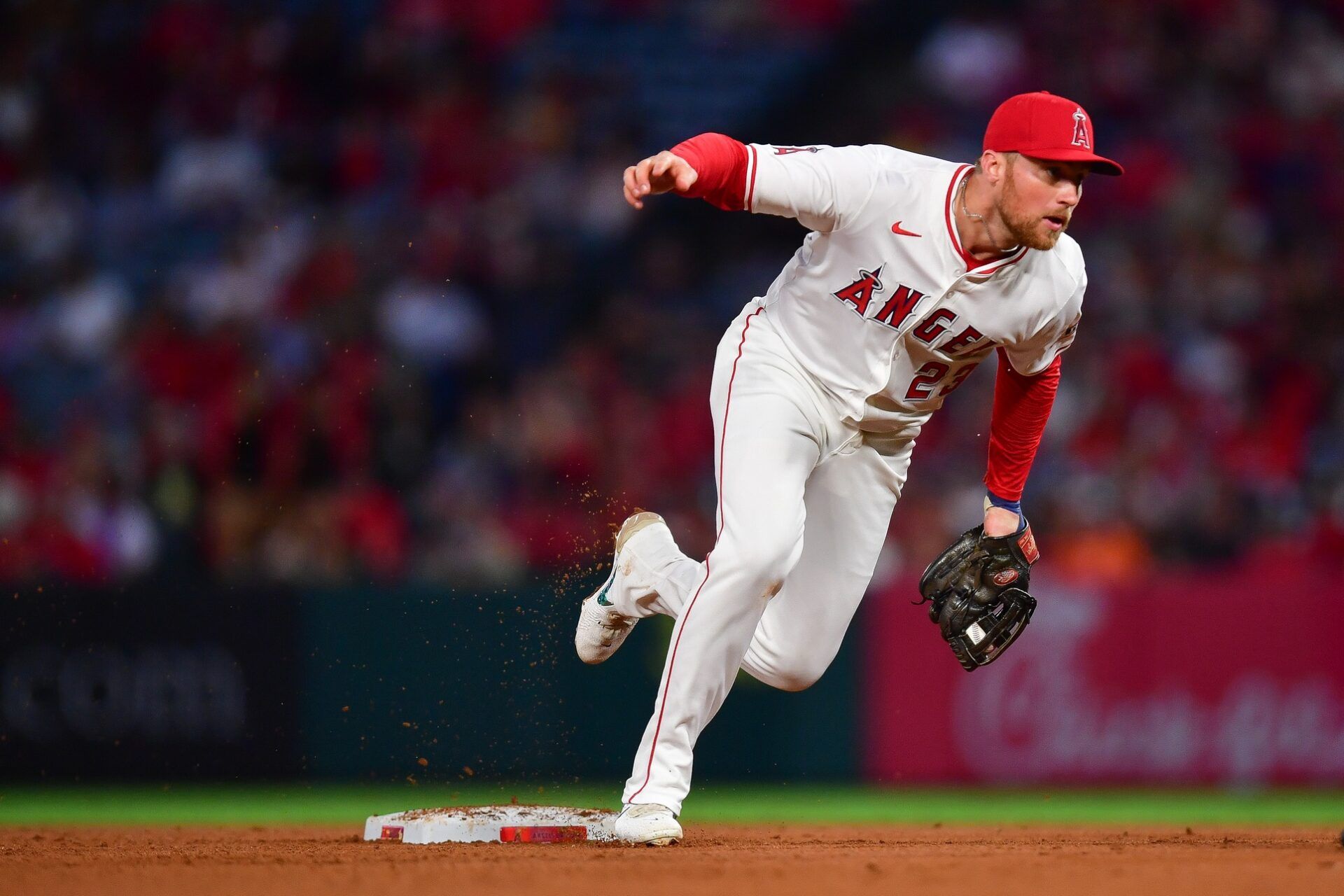 Los Angeles Angels second baseman Brandon Drury (23) tags second for the out on a fielders choice against Seattle Mariners right fielder Victor Robles (10) during the fourth inning at Angel Stadium.