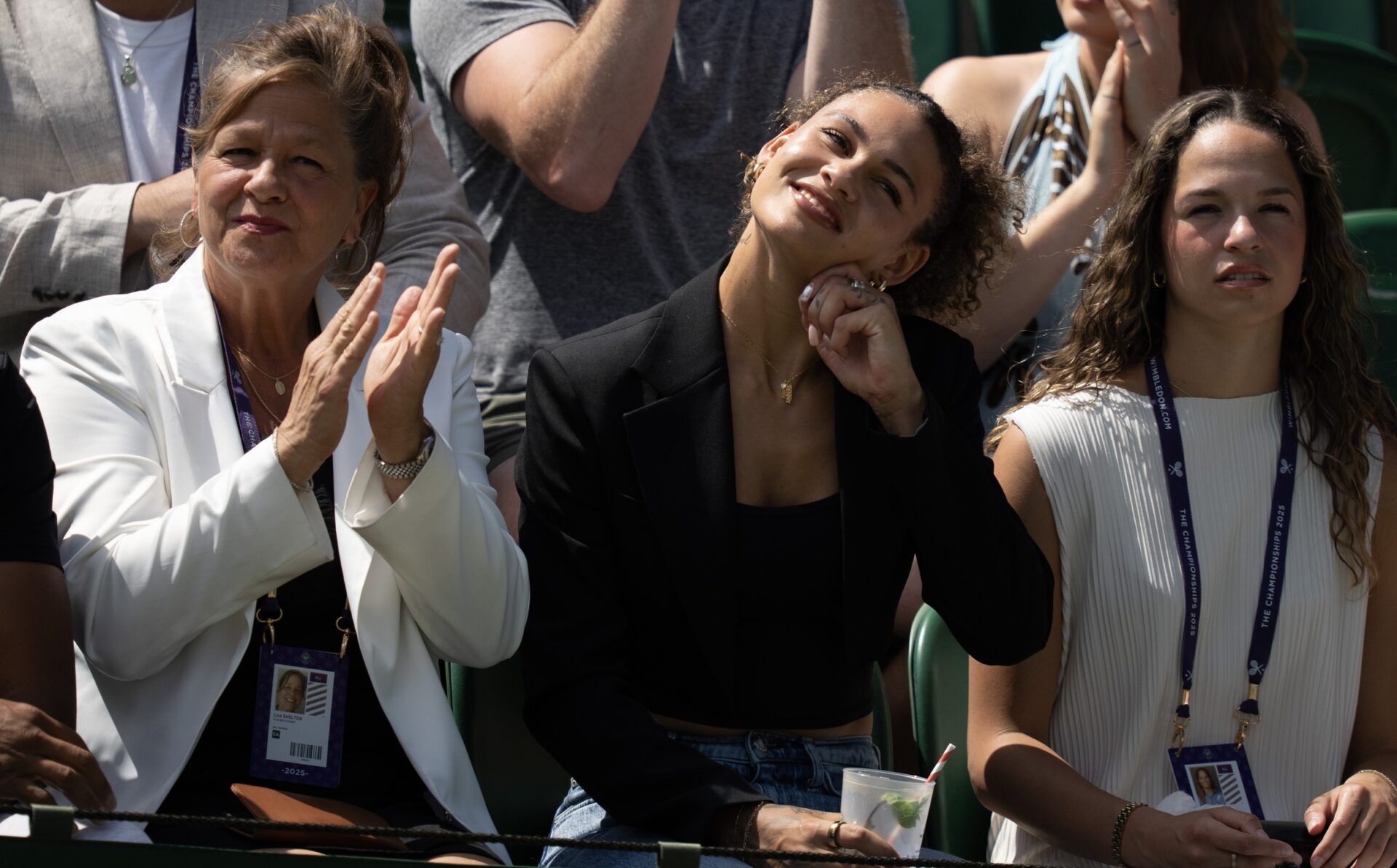 Lisa Shelton, Trinity Rodman and Emma Shelton in attendance for the Ben Shelton of the United States and Rinky Hijikata of Australia (both not shown) match completion on day five at the All England Lawn Tennis and Croquet Club.