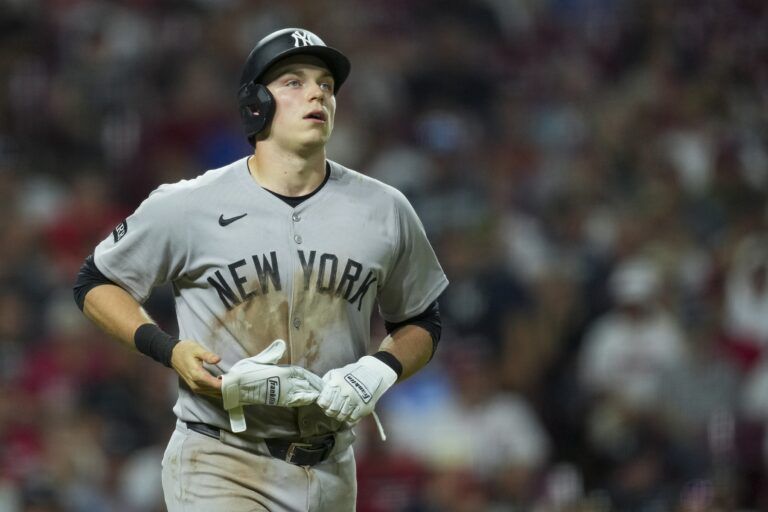 New York Yankees first baseman Ben Rice draws a walk against the Cincinnati Reds in the eighth inning at Great American Ball Park.