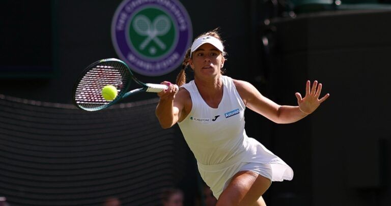 Solana Sierra (ARG) hits a forehand against Katie Boulter (GBR)(not pictured) on day three of The Championships Wimbledon 2025 at All England Lawn Tennis and Croquet Club.