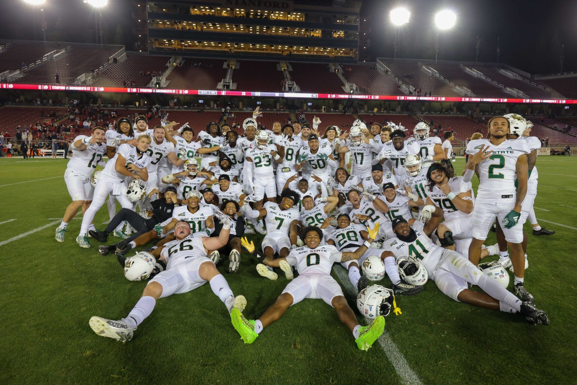 Sacramento State Hornets players pose for a photo after the game against the Stanford Cardinal at Stanford Stadium.