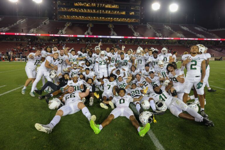 Sacramento State Hornets players pose for a photo after the game against the Stanford Cardinal at Stanford Stadium.