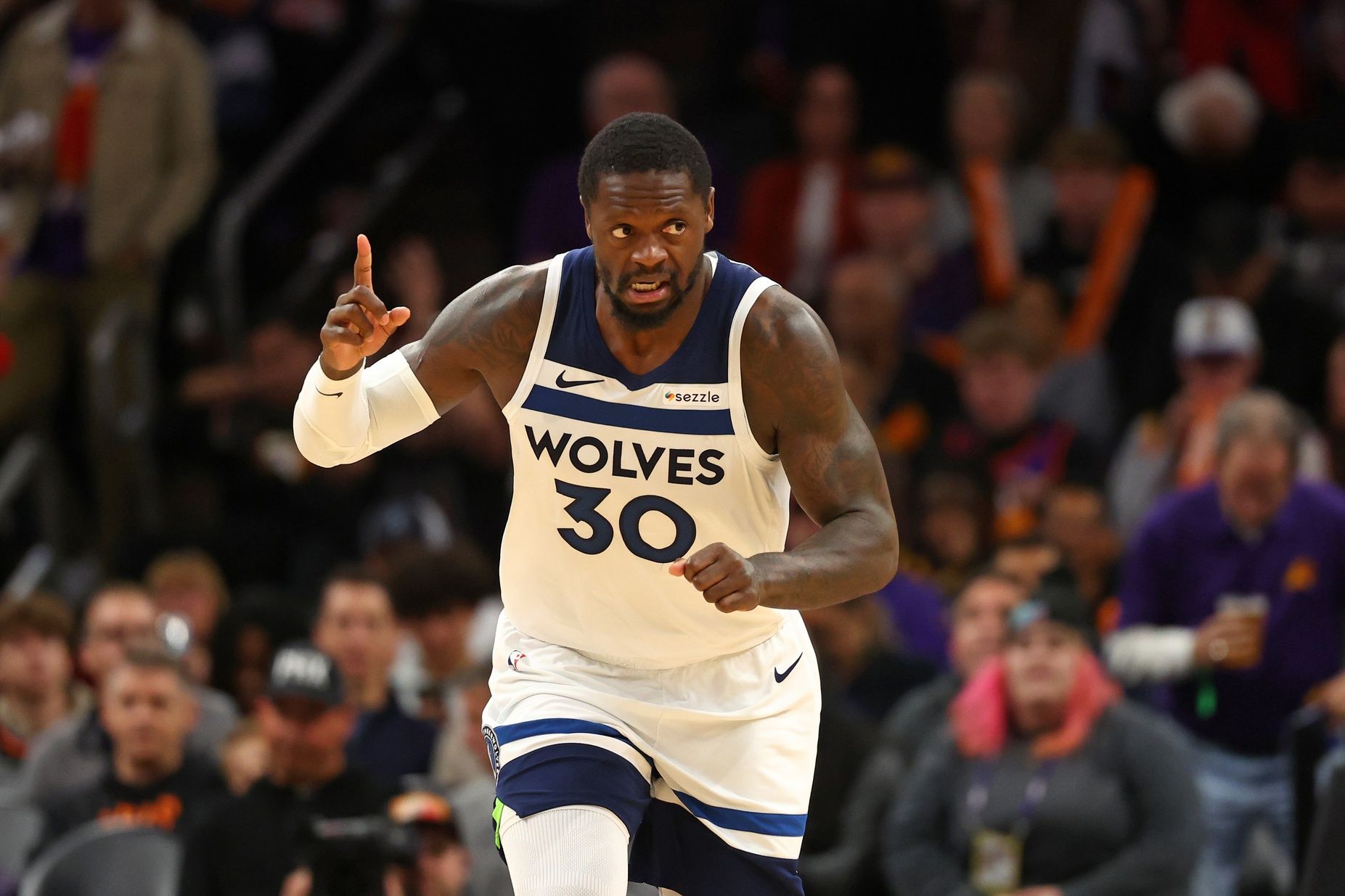 Minnesota Timberwolves forward Julius Randle (30) reacts against the Phoenix Suns in the second half at Footprint Center.