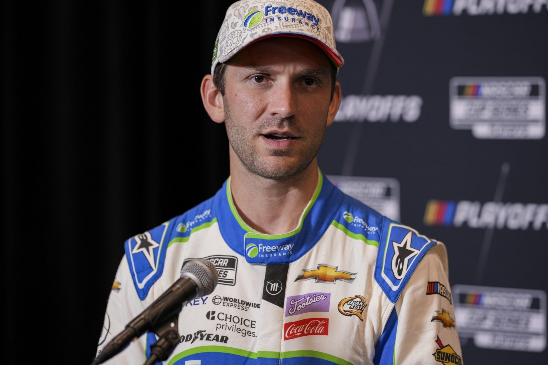 Daniel Suarez speaks to media members during the NASCAR Playoffs Media Day at the Charlotte Convention Center.