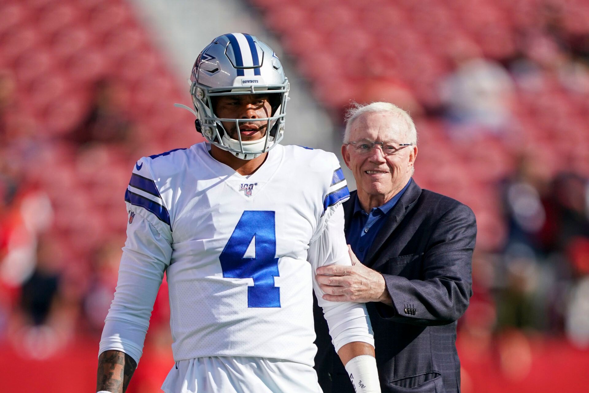 Dallas Cowboys quarterback Dak Prescott (4) and owner Jerry Jones (right) before the game against the San Francisco 49ers at Levi's Stadium.