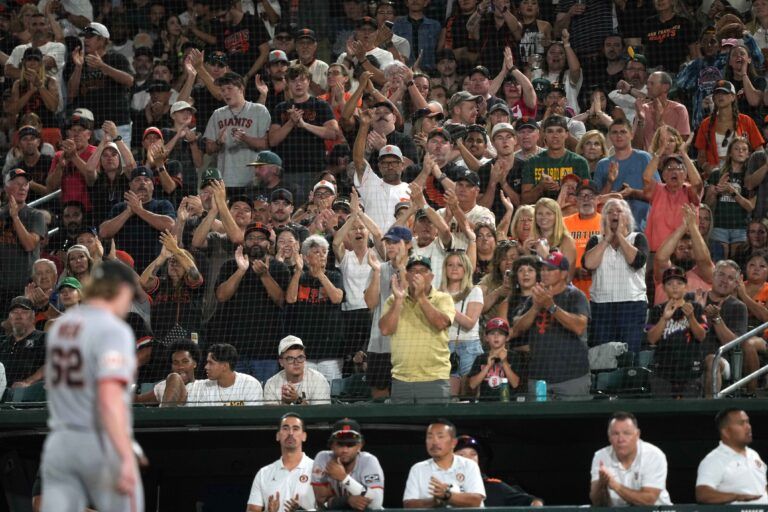 San Francisco Giants fans cheer after pitcher Logan Webb (62) is removed from the game during the seventh inning against the Athletics at Sutter Health Park.
