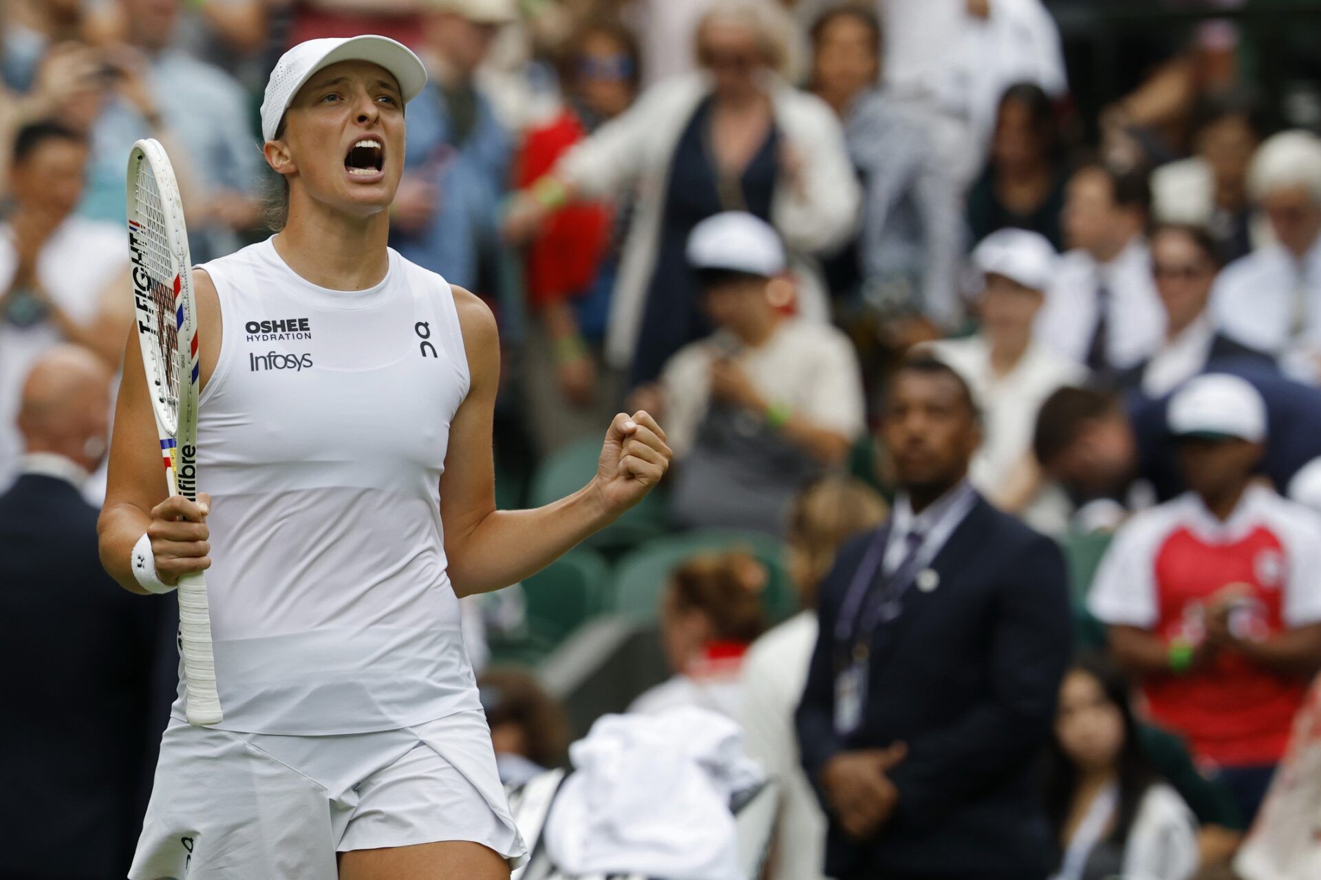 Iga Swiatek (POL) celebrates after her match against Danielle Collins (USA)(not pictured) on day six of The Championships Wimbledon 2025 at All England Lawn Tennis and Croquet Club.