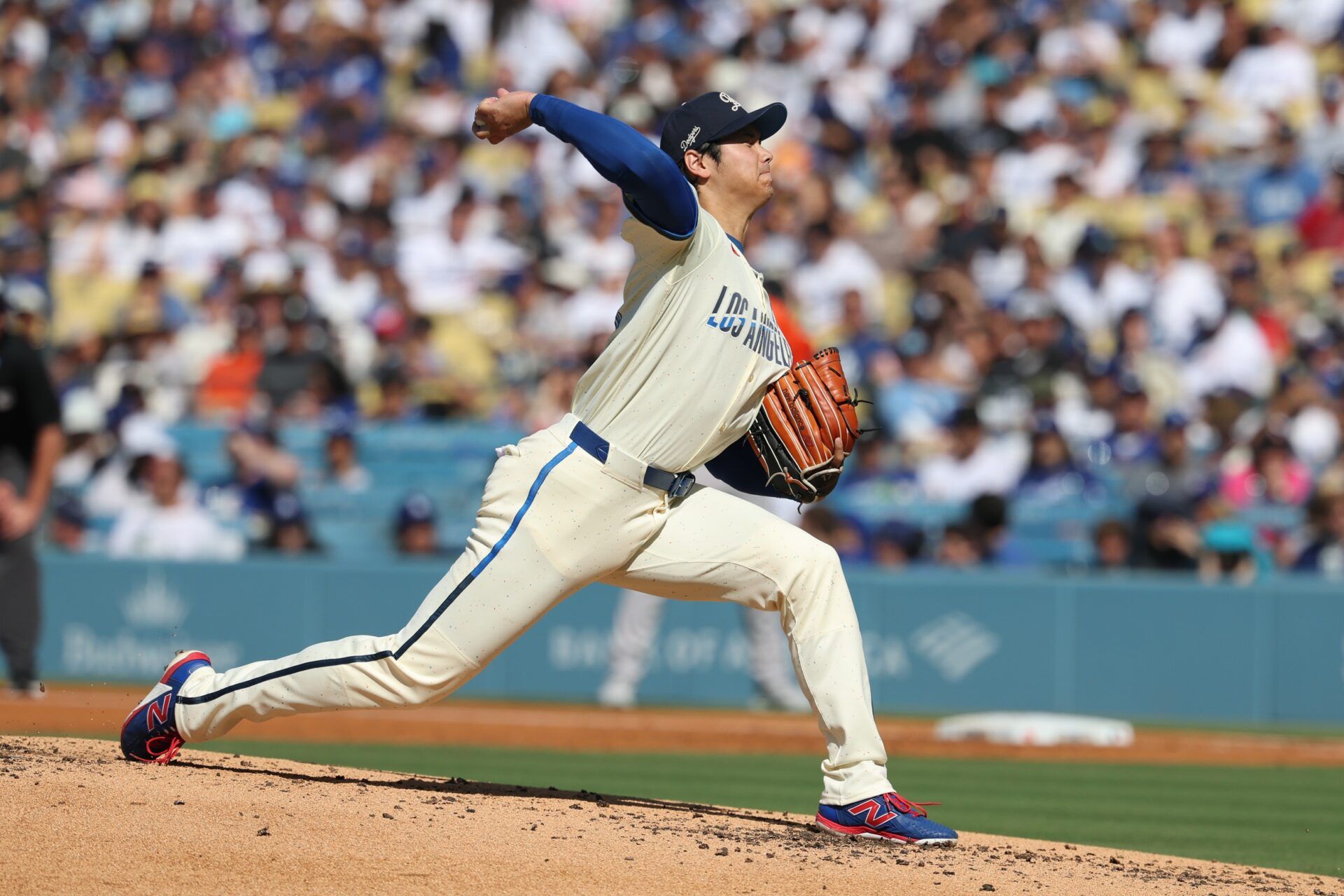 Los Angeles Dodgers two-way player Shohei Ohtani (17) throws to the plate during the second inning against the Houston Astros at Dodger Stadium.
