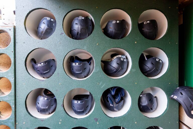 New York Yankees helmets in the dugout before a game against the Oakland Athletics at Oakland-Alameda County Coliseum.