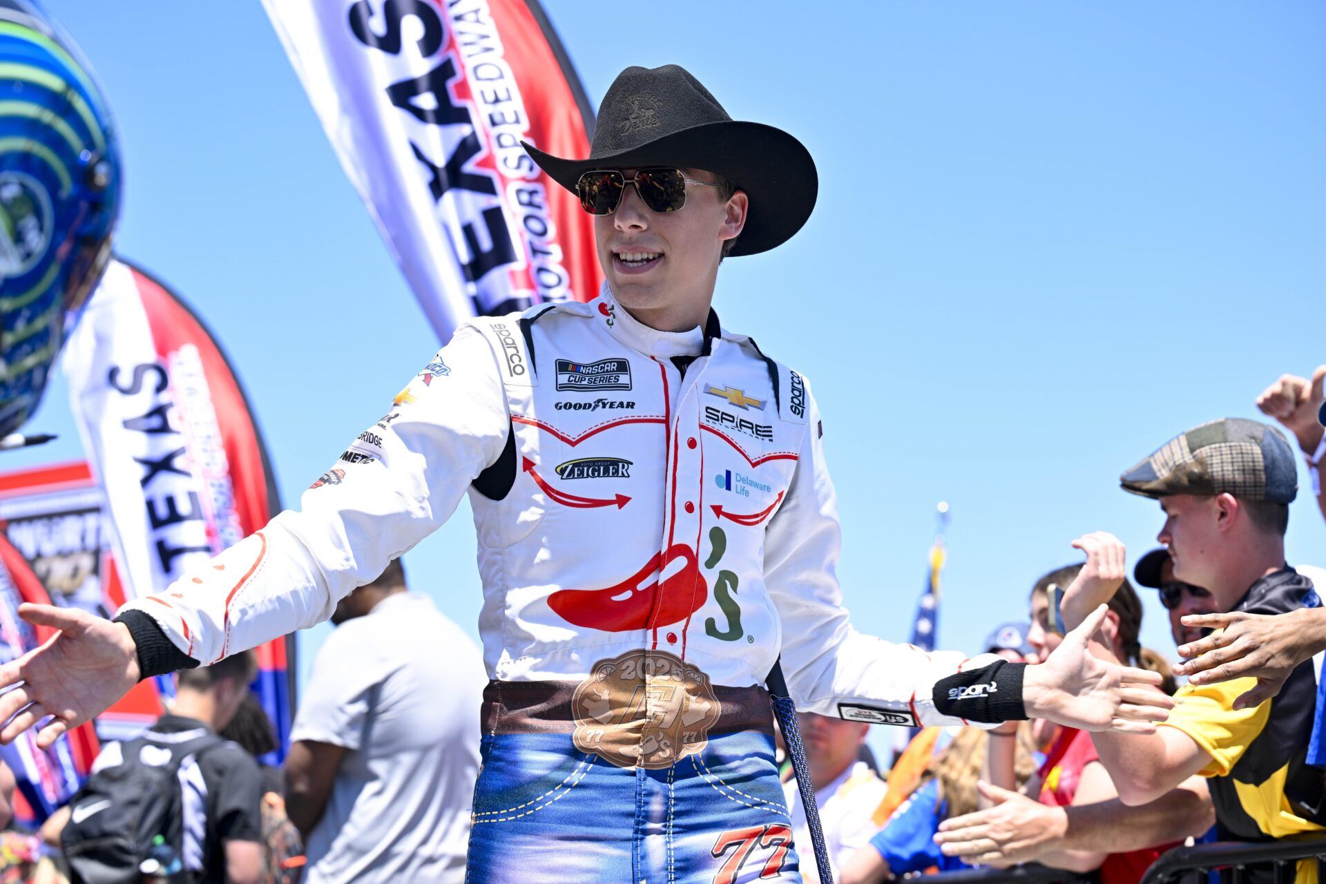 NASCAR Cup Series driver Carson Hocevar (77) is introduced before the start of the Wurth 400 race at Texas Motor Speedway.