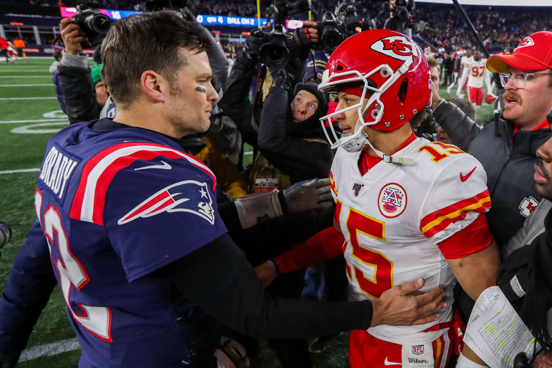 New England Patriots quarterback Tom Brady (12) and Kansas City Chiefs quarterback Patrick Mahomes (15) after the game at Gillette Stadium.
