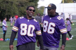 Minnesota Vikings former receivers Cris Carter (80) and Jake Reed (86) at the NFL flag football event at The Grove.