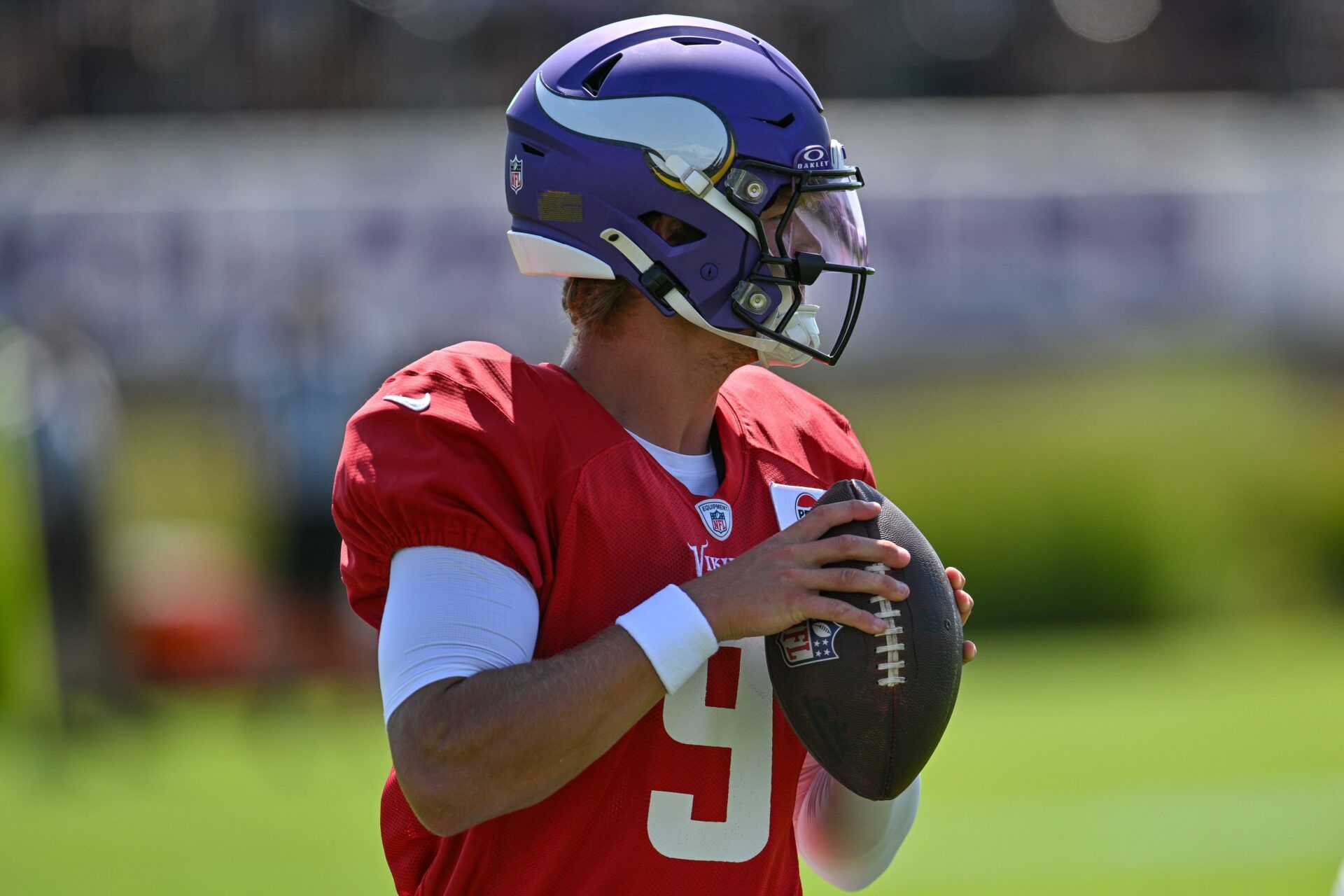 Minnesota Vikings quarterback J.J. McCarthy (9) warms up during practice at Vikings training camp in Eagan, MN.