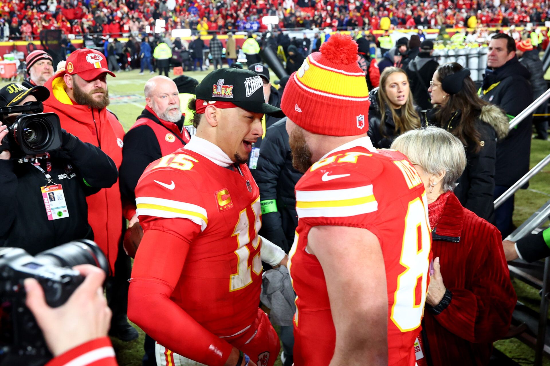 Kansas City Chiefs quarterback Patrick Mahomes (15) and tight end Travis Kelce (87) react after the AFC Championship gameagainst the Buffalo Bills at GEHA Field at Arrowhead Stadium.