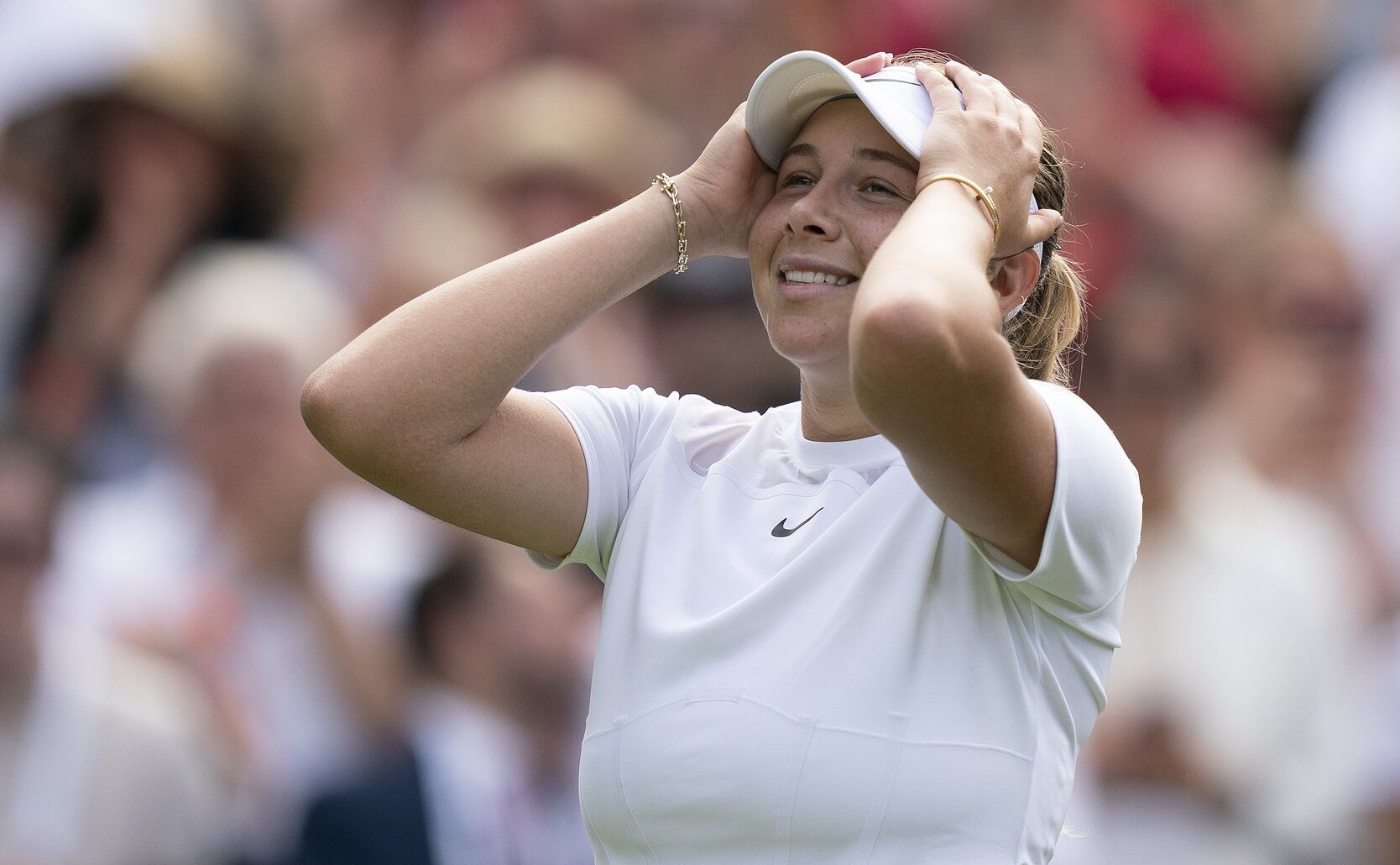 Amanda Anisimova (USA) celebrates winning her match against Coco Gauff (USA) on day six at All England Lawn Tennis and Croquet Club.