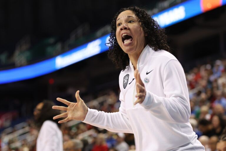 Duke Blue Devils head coach Kara Lawson reacts to a play abasing Louisville Cardinals during the first quarter at First Horizon Coliseum.