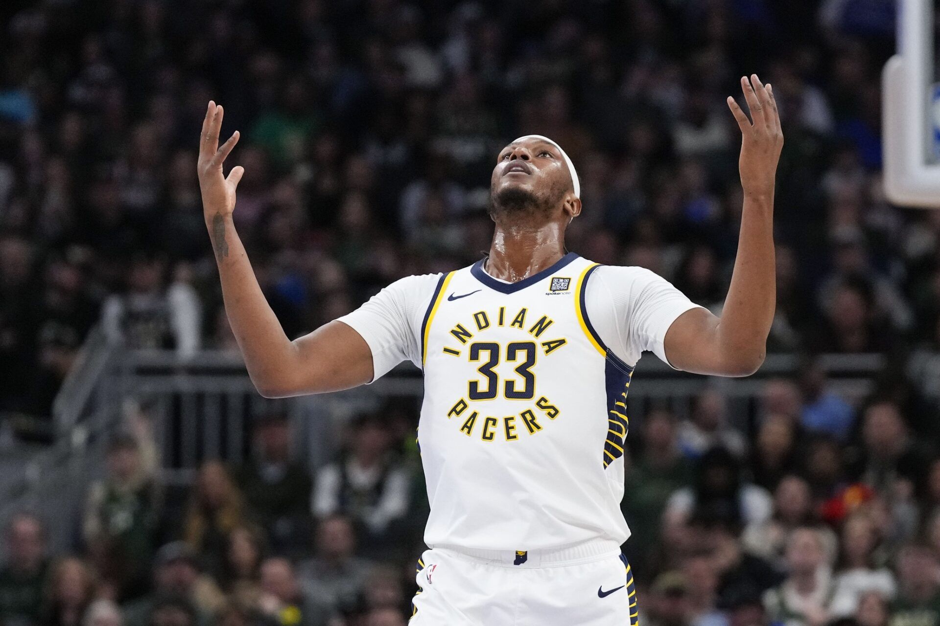 Indiana Pacers center Myles Turner (33 reacts after scoring a basket during the first quarter against the Milwaukee Bucks at Fiserv Forum.