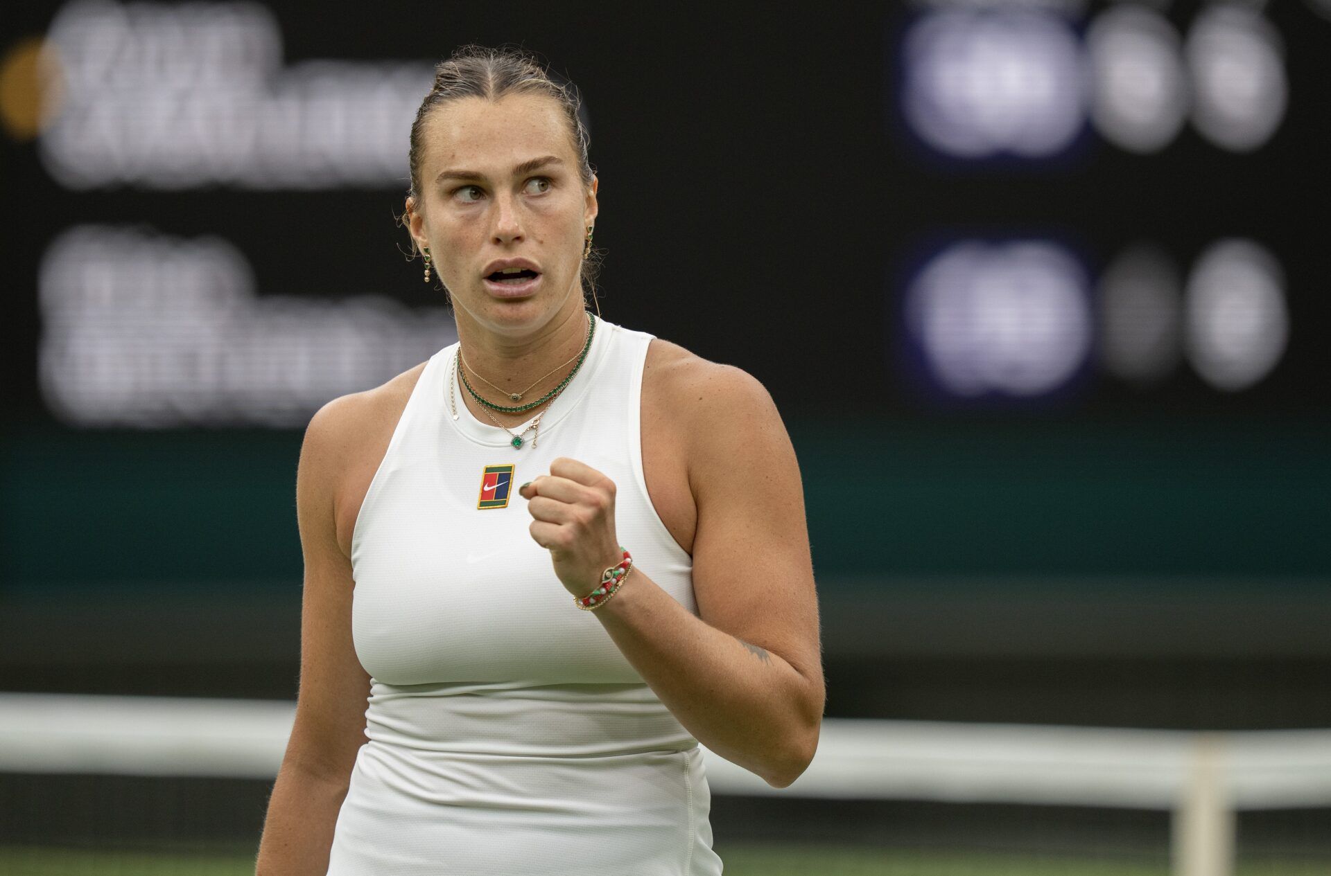 Aryna Sabalenka reacts to a point during her match against Elise Mertens of Belgium on day seven at the All England Lawn Tennis and Croquet Club.