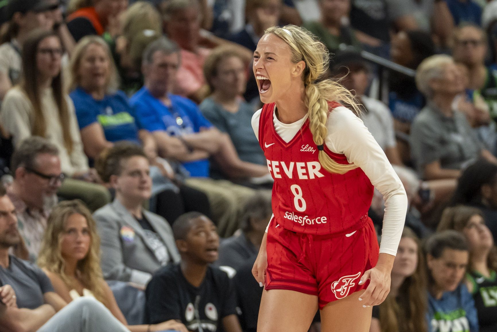Indiana Fever guard Sophie Cunningham (8) celebrates after making a three point shot against the Minnesota Lynx in the second half during the Commissioner's Cup final at Target Center.