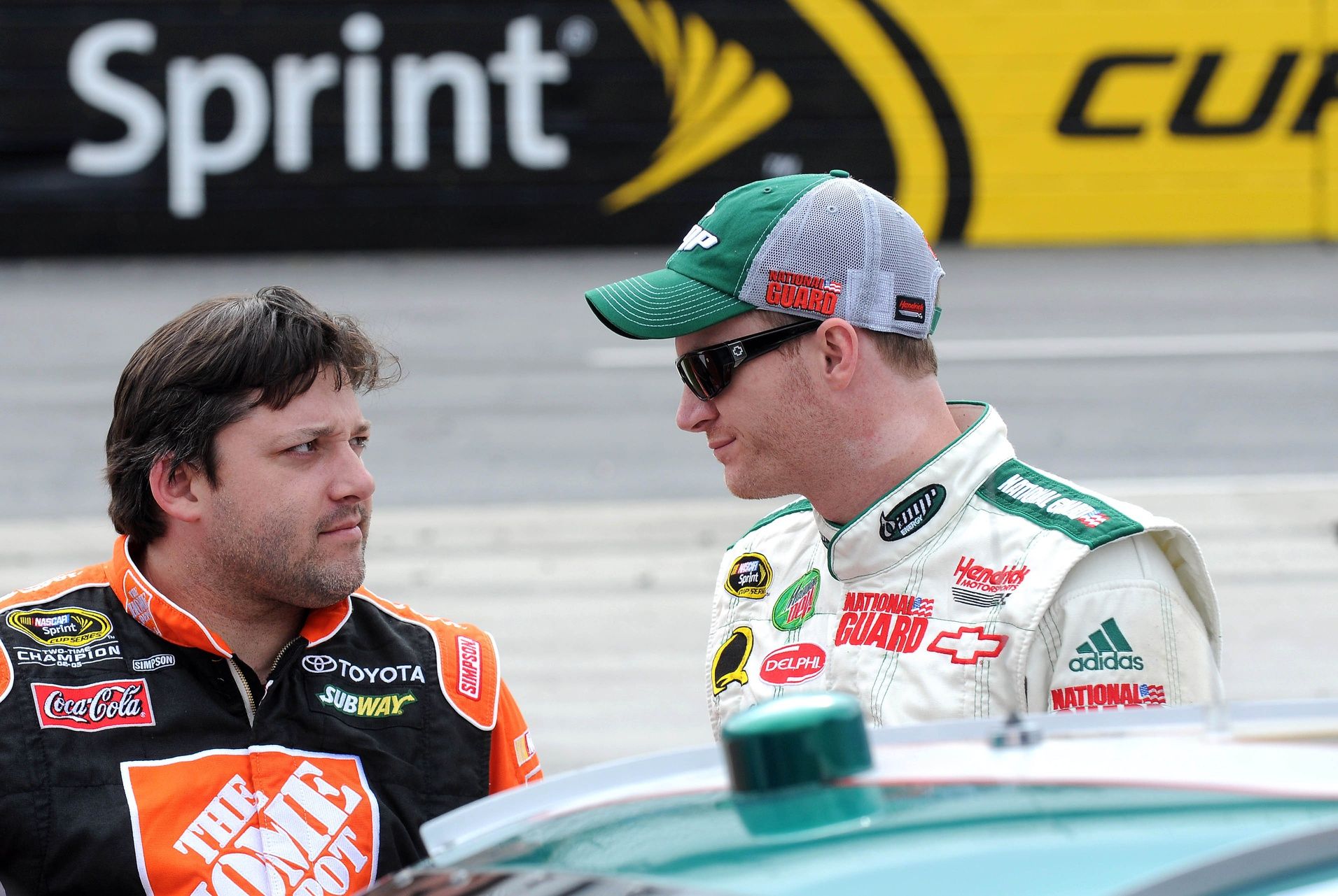 NASCAR SPRINT Cup Series drivers Tony Stewart (20) and Dale Earnhardt Jr (88) during Qualifying for the Goody's Cool Orange 500 at Martinsville Speedway.