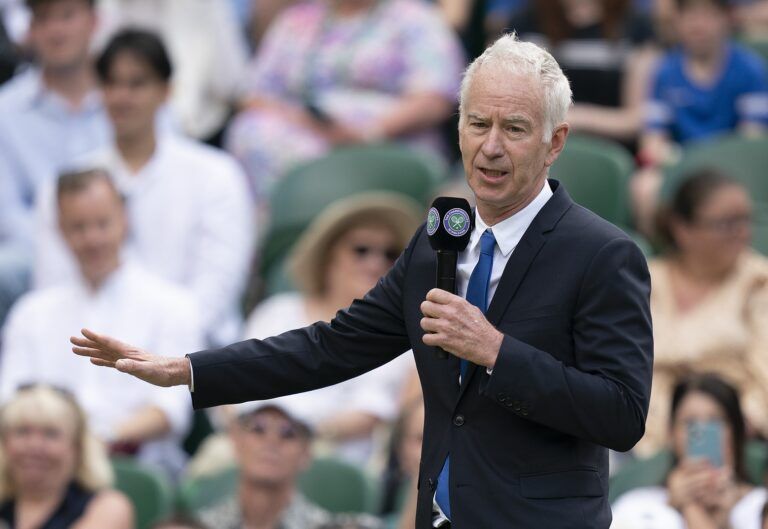 On the inaugural middle Sunday for play, Wimbledon celebrates 100 years since their move to Church Road and the centenary of Centre Court. Past champions were on court for this special ceremony on day seven at All England Lawn Tennis and Croquet Club. Shown here, John McEnroe and Sue Barker.