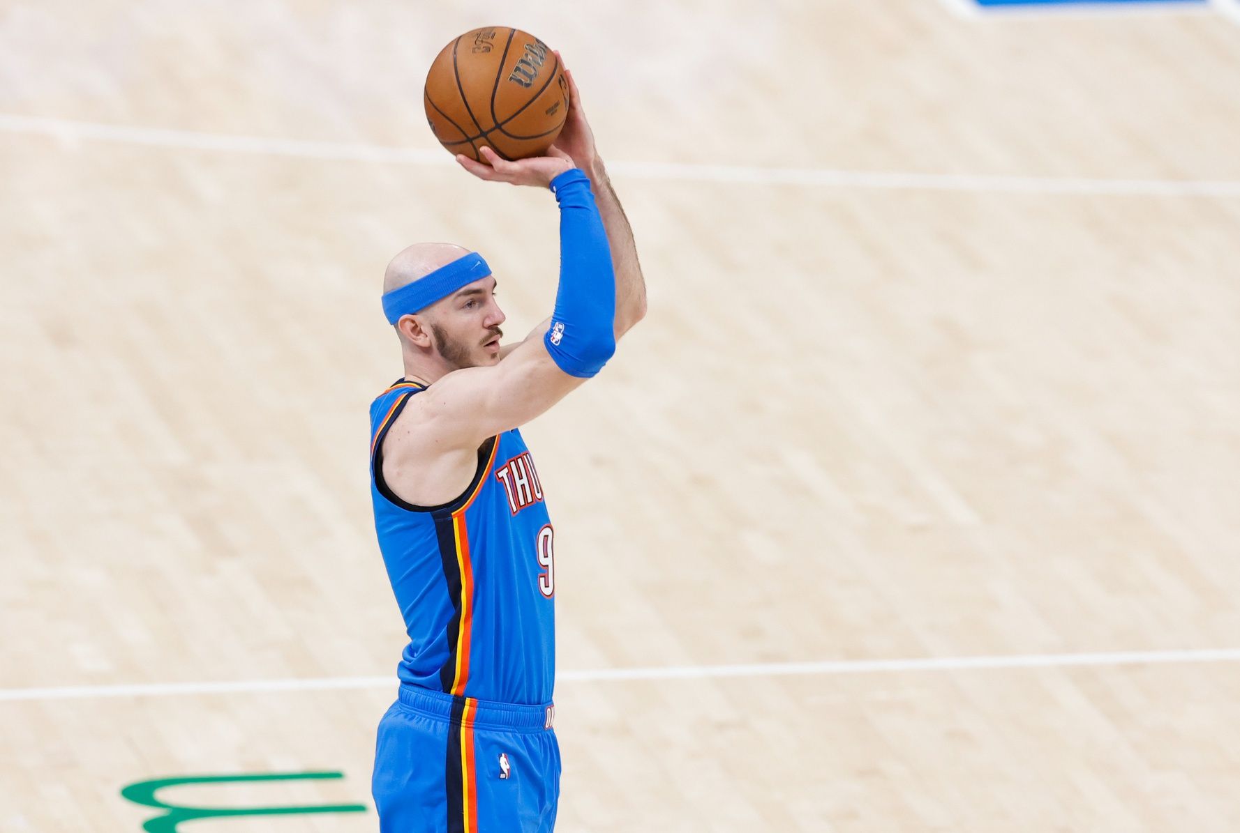 Oklahoma City Thunder guard Alex Caruso (9) jumps for a shot against the Indiana Pacers during the first half of game seven of the 2025 NBA Finals at Paycom Center.