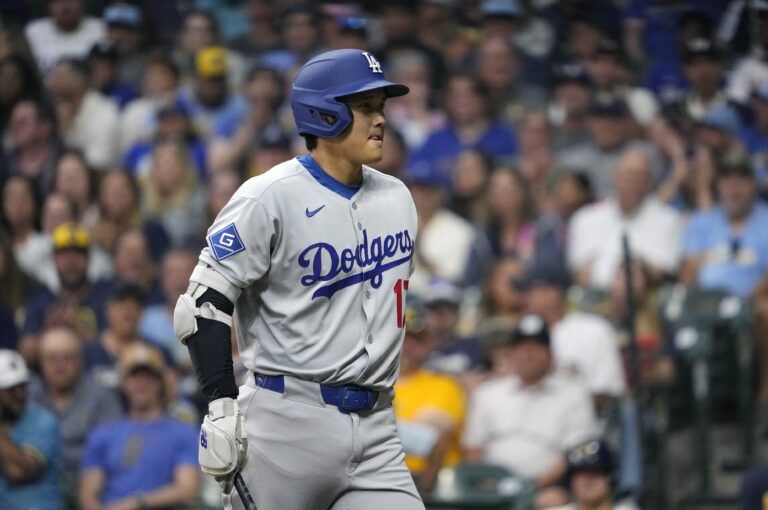 Los Angeles Dodgers two-way player Shohei Ohtani (17) walks away from the batter’s box after being called out on strikes against the Milwaukee Brewers in the sixth inning.at American Family Field.