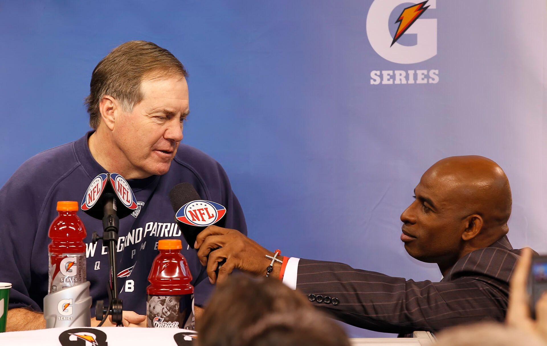 Head coach Bill Belichick of the New England Patriots is interviewed by Deion Sanders during the AFC Champions' Media Day session at Lucas Oil Stadium for Super Bowl XLVI on Tuesday, January 31, 2012, in Indianapolis, Indiana. (Sam Riche/Tribune News Service via Getty Images)