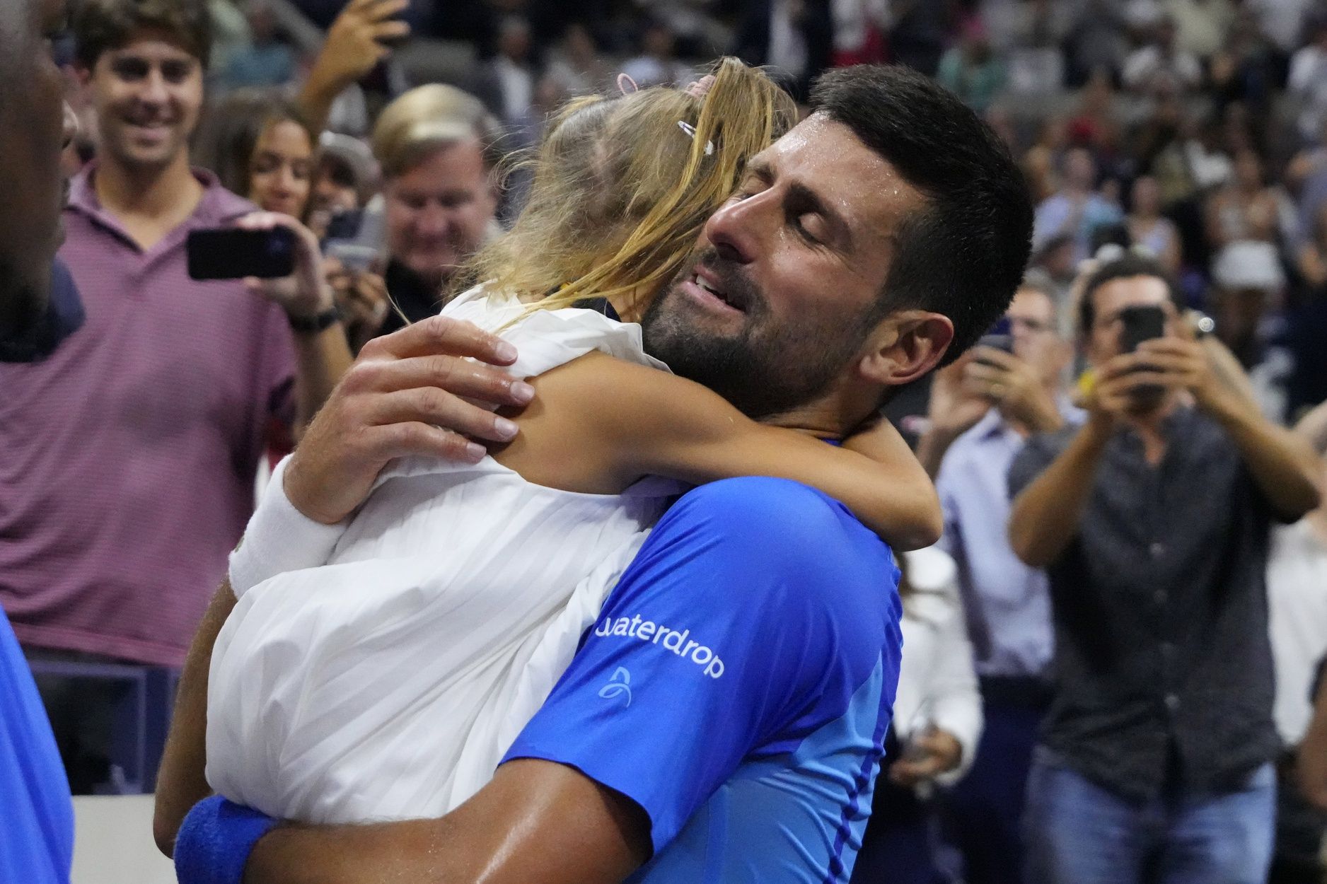 Novak Djokovic of Serbia celebrates with his daughter Tara after his match against Daniil Medvedev (not pictured) in the men's singles final on day fourteen of the 2023 U.S. Open tennis tournament at USTA Billie Jean King National Tennis Center.