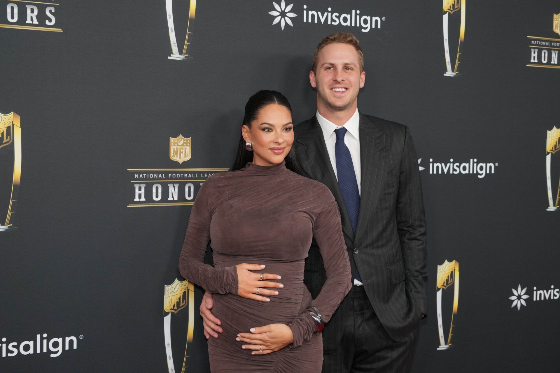 Jared Goff and his wife Christen Harper on the red carpet before Super Bowl LIX NFL Honors at Saenger Theatre.