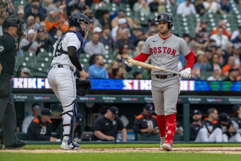 Boston Red Sox third base Alex Bregman (2) strikes out to end the first inning against the Detroit Tigers at Comerica Park.