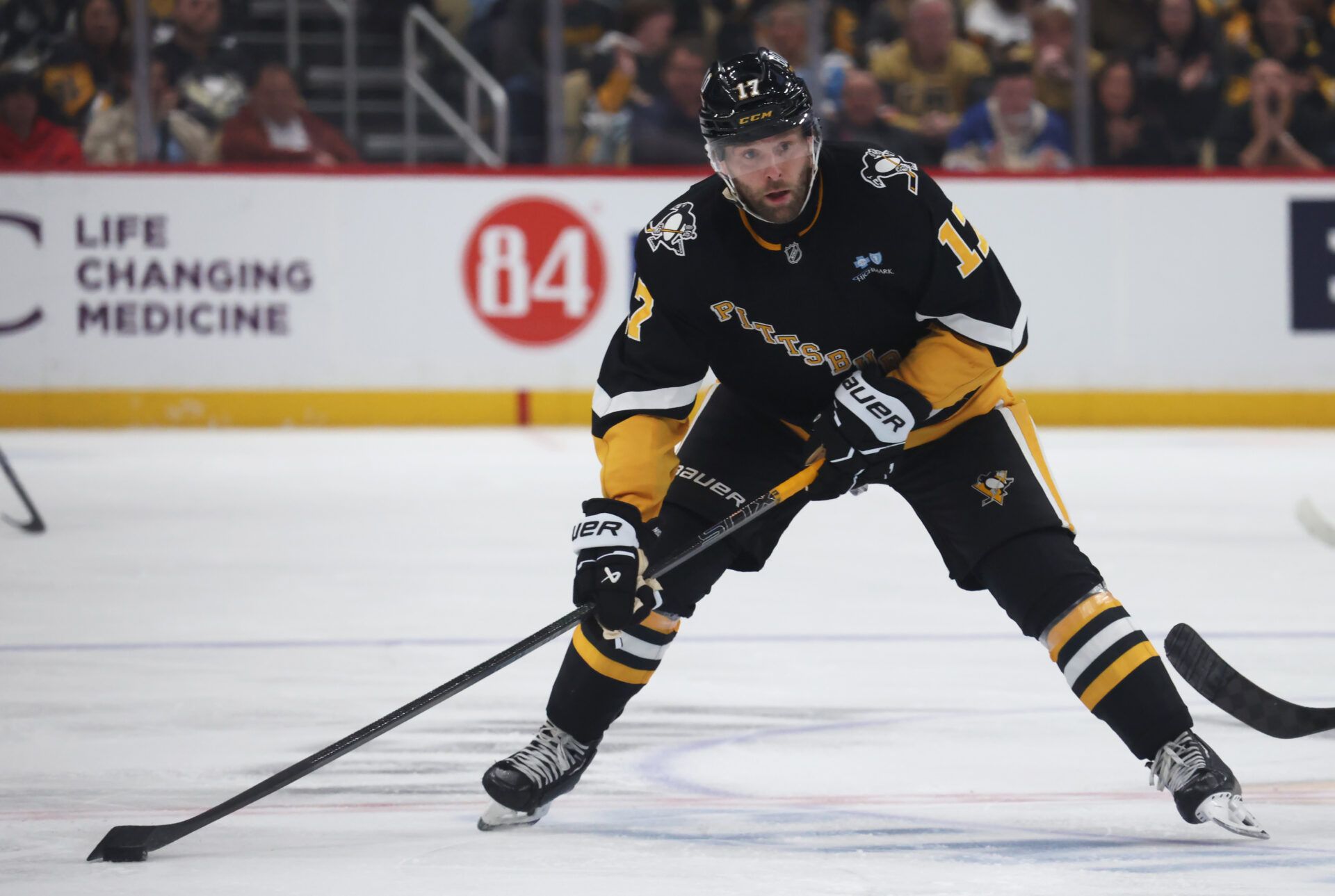 Pittsburgh Penguins right wing Bryan Rust (17) skates with the puck against the Vegas Golden Knights during the third period at PPG Paints Arena.