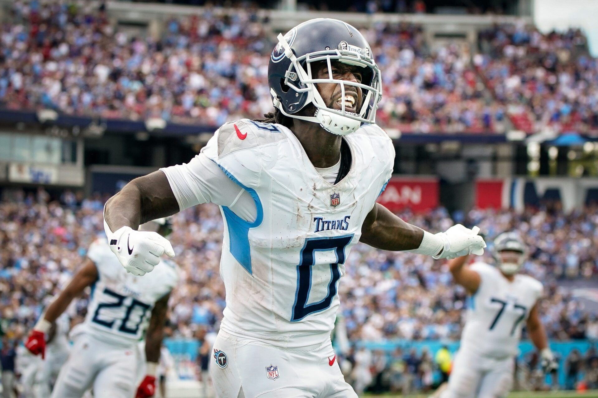 Tennessee Titans wide receiver Calvin Ridley (0) celebrates after scoring a touchdown against the New York Jets at Nissan Stadium in Nashville on Sept. 15, 2024. The Titans lost their home opener 24-17.