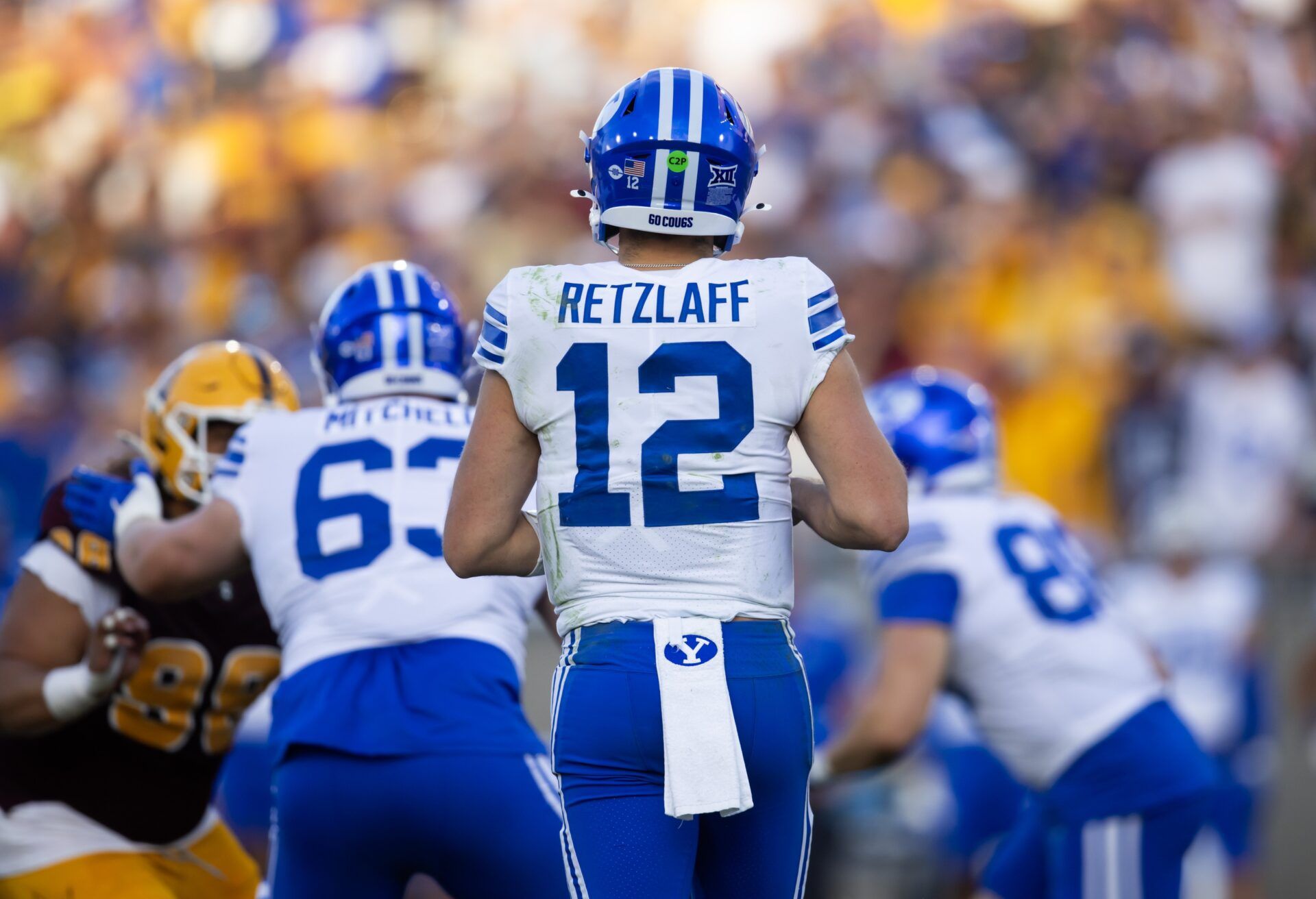 Detailed view of the jersey of Brigham Young Cougars quarterback Jake Retzlaff (12) against the Arizona State Sun Devils at Mountain America Stadium.
