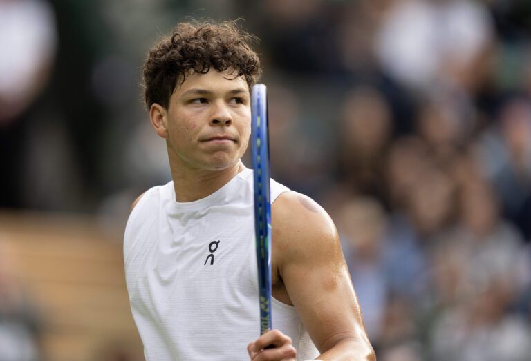 Ben Shelton of the United States reacts to a point during his match against Lorenzo Sonego of Italy on day eight at All England Lawn Tennis and Croquet Club.