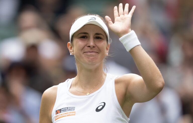 Belinda Bencic of Switzerland celebrates winning her match against Ekaterina Alexandrova on day eight at All England Lawn Tennis and Croquet Club.