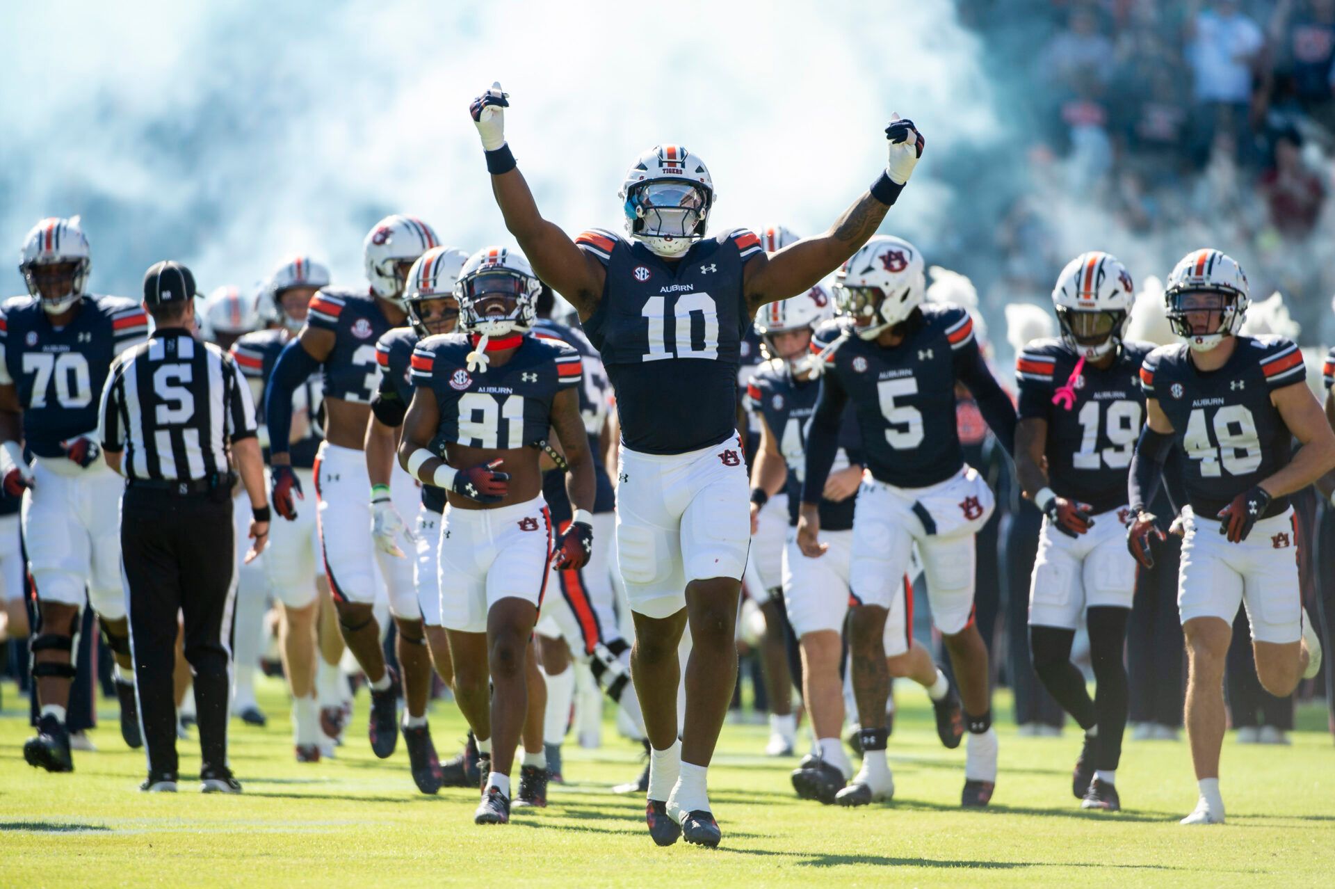 AUBURN, ALABAMA - NOVEMBER 16: Members of the Auburn Tigers run out on the field prior to their game against the Louisiana Monroe Warhawks at Jordan-Hare Stadium on November 16, 2024 in Auburn, Alabama. (Photo by Michael Chang/Getty Images)