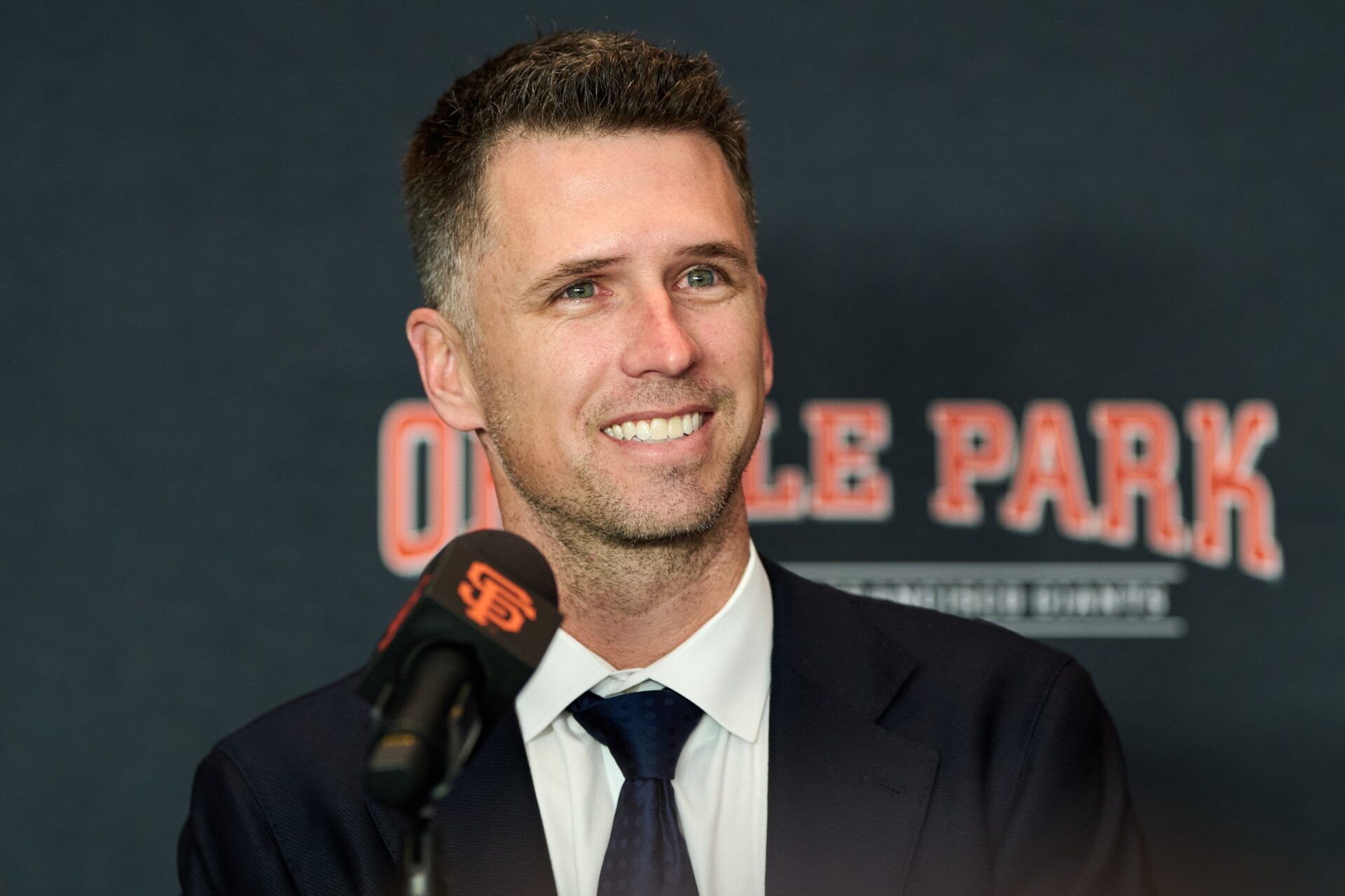 San Francisco Giants president of baseball operations Buster Posey speaks during the introductory press conference for shortstop Willy Adames (not pictured) at Oracle Park.