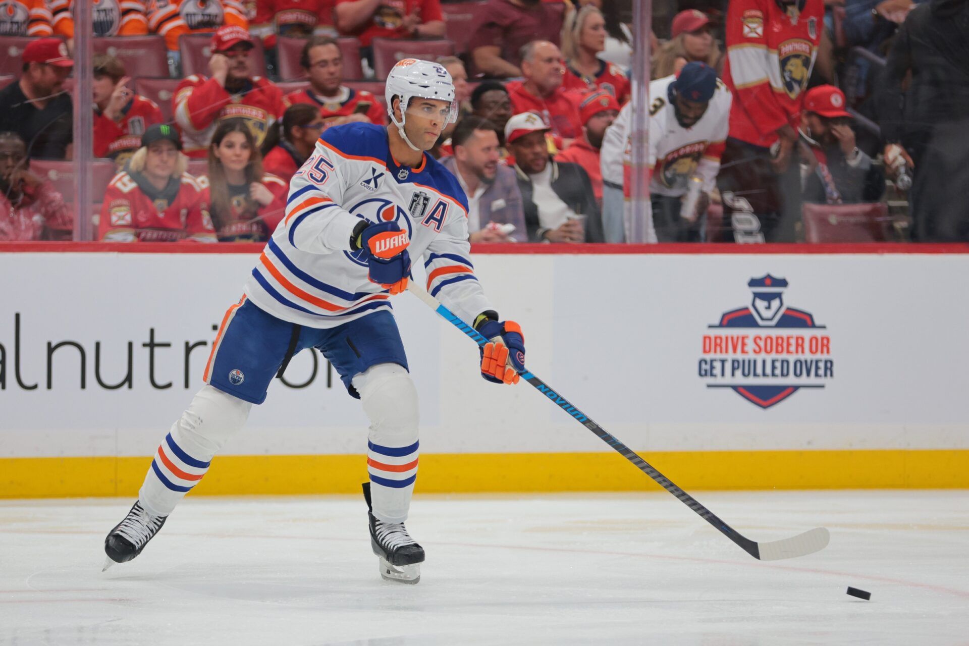 Edmonton Oilers defenseman Darnell Nurse (25) passes the puck during the second period against the Florida Panthers in game four of the 2025 Stanley Cup Final at Amerant Bank Arena.